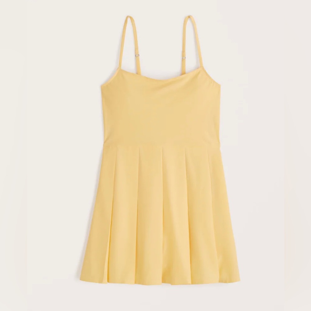 Pleated Traveler Mini Dress in Yellow
